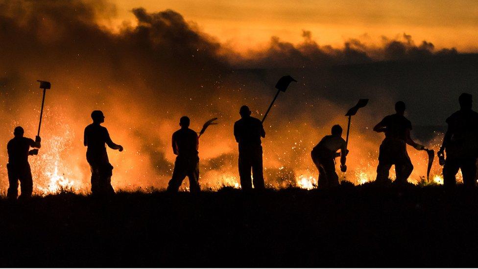 firefighters try to quell fire