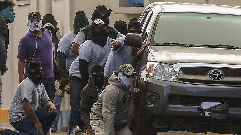 Paramilitaries surround the San Sebastián Basilica, in Diriamba, Nicaragua on July 09, 2018