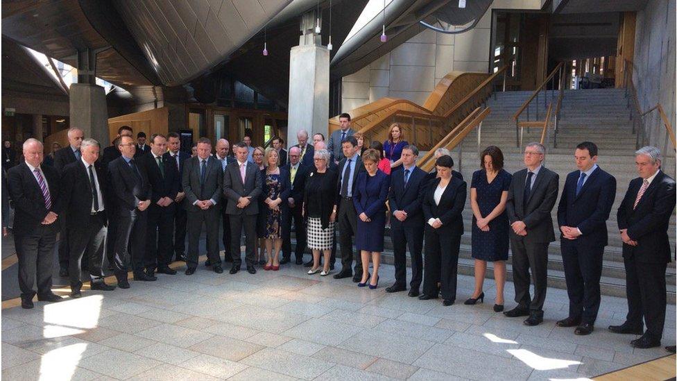 MSPs gathered to mark the minute's silence at Holyrood.