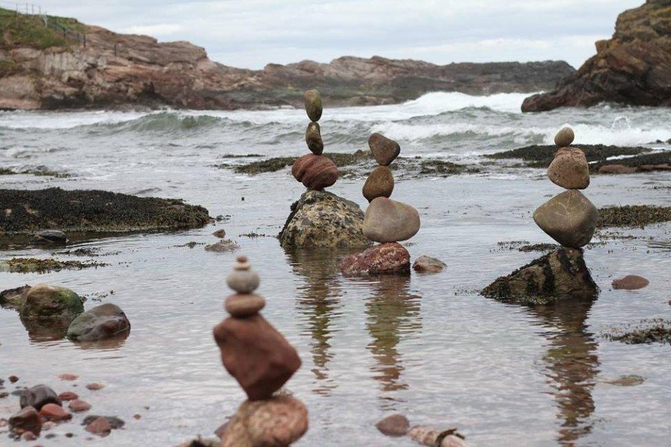 Four small stone stacks