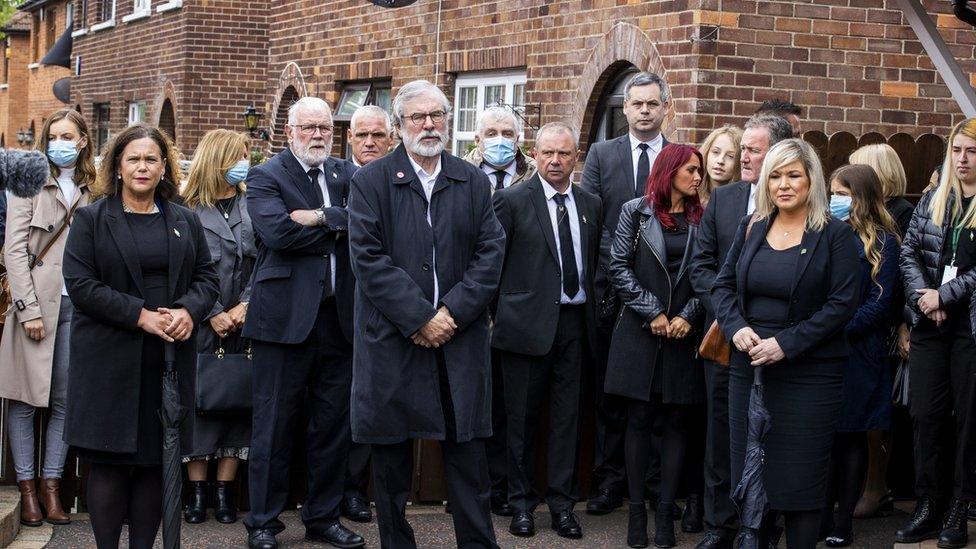 Sinn Féin leader Mary Lou McDonald, former leader Gerry Adams, and deputy leader Michelle O"Neill attending the funeral of Bobby Storey