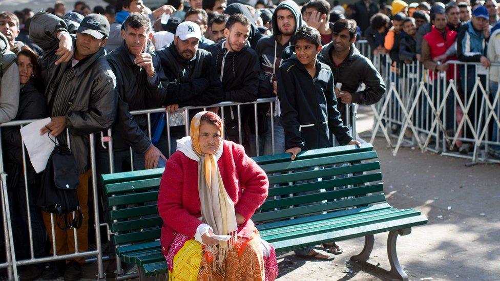 Migrants queuing in Berlin in October 2015