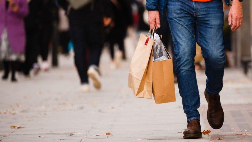 Man shopping on Oxford Street