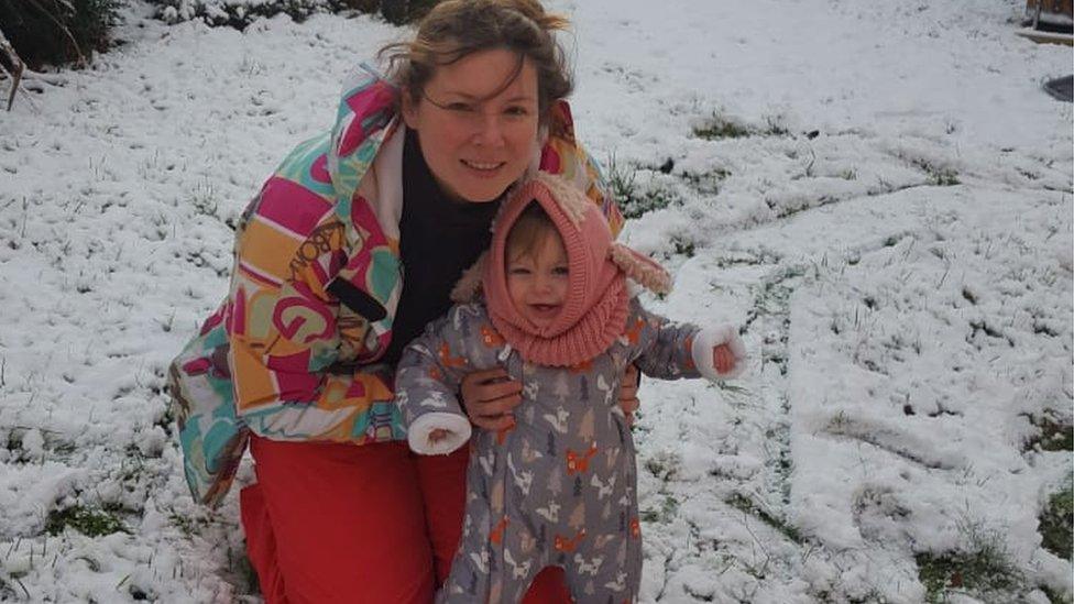 Baby India and her mum Carys in the snow