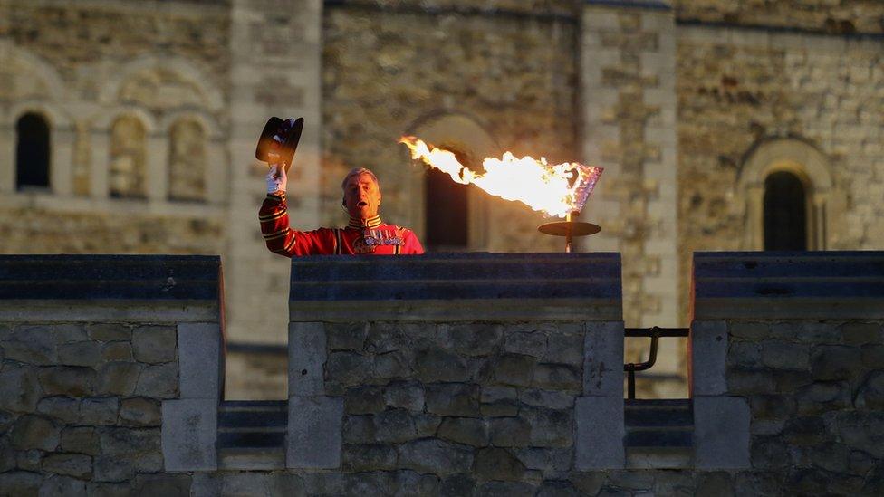 The Chief Yeoman Warder at the Tower of London lit a beacon to celebrate Queen's birthday.