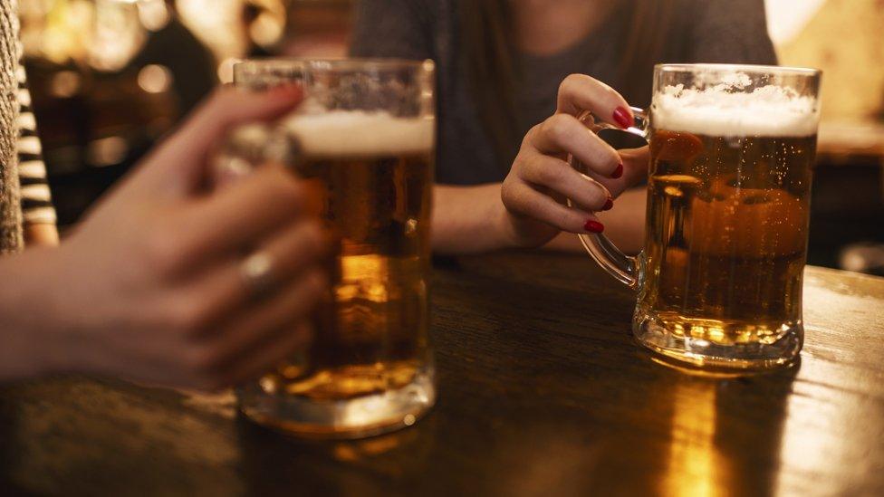 Women drinking beer