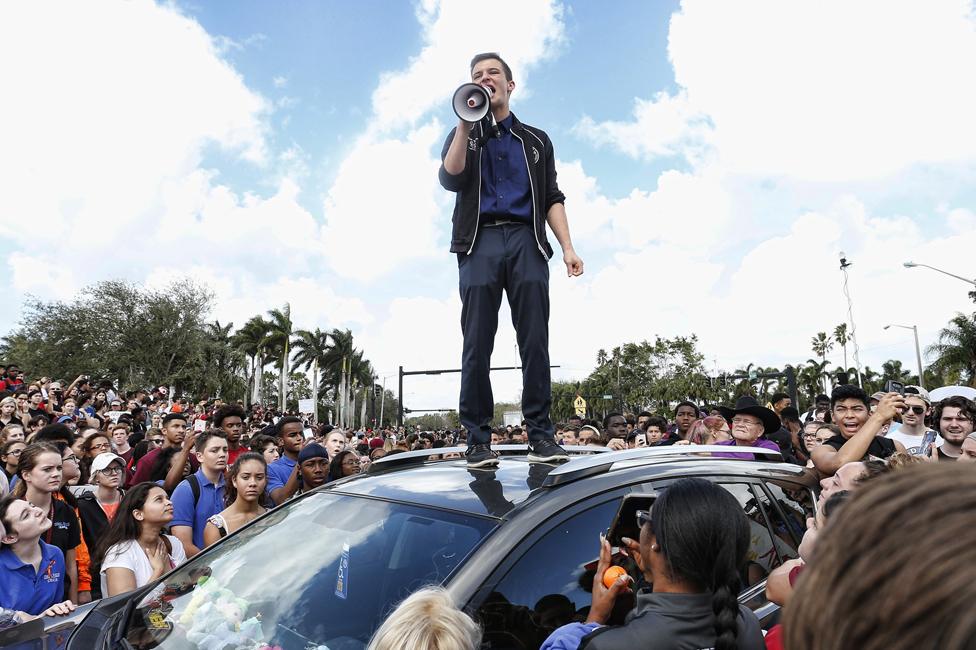 Cameron Kasky speaking to a rally at Marjory Stoneman Douglas High School after participating in a county wide school walk out