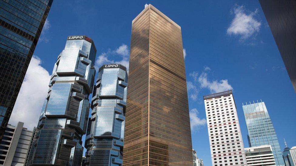 An exterior view shows the Far East Finance Centre, in gold, which houses the South Korea"s Consulate