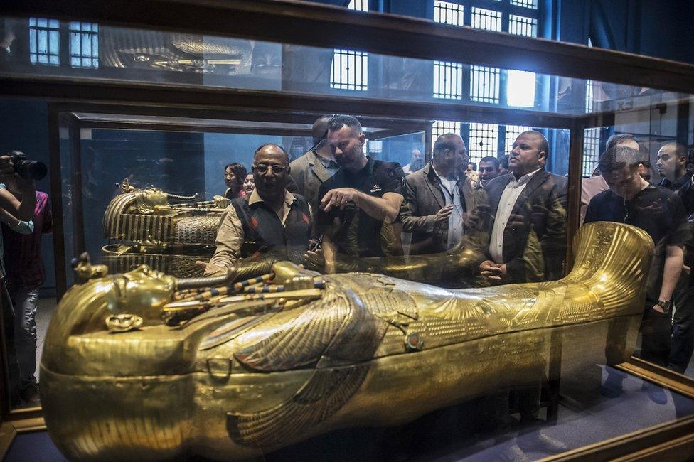 Former Man U star Ryan Giggs visits a museum in Cairo on Wednesday while in town for the UEFA Champions League trophy tour.