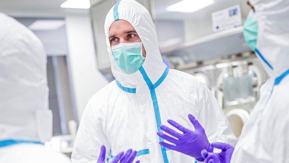 Medical staff in protective suit