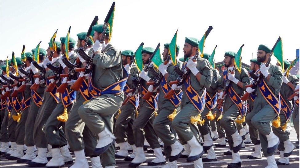 Iranian soldiers march during the annual military parade marking the anniversary of the outbreak of its devastating 1980-1988 war with Saddam Hussein's Iraq, on September 22,2017 in Tehran