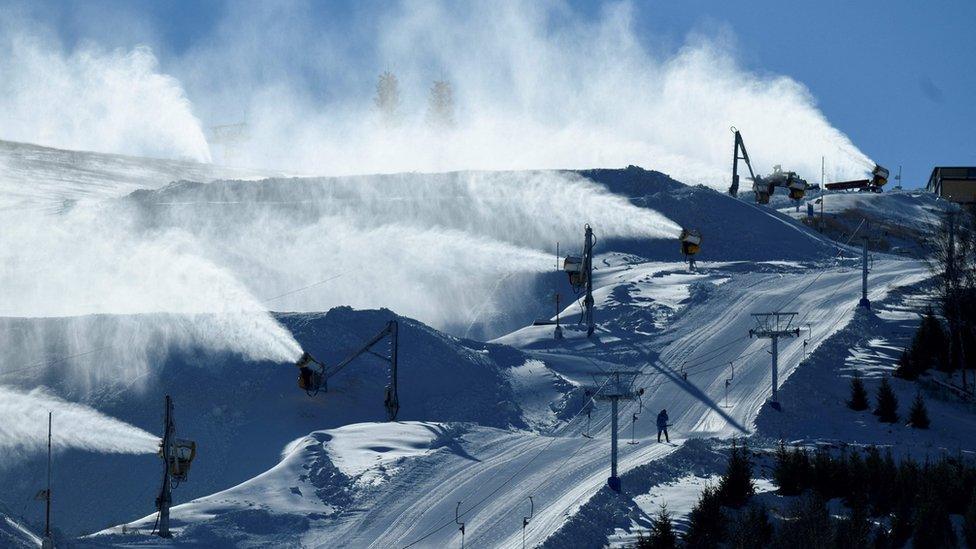 Snow making machines at a Beijing Winter Olympic test event in November 2021