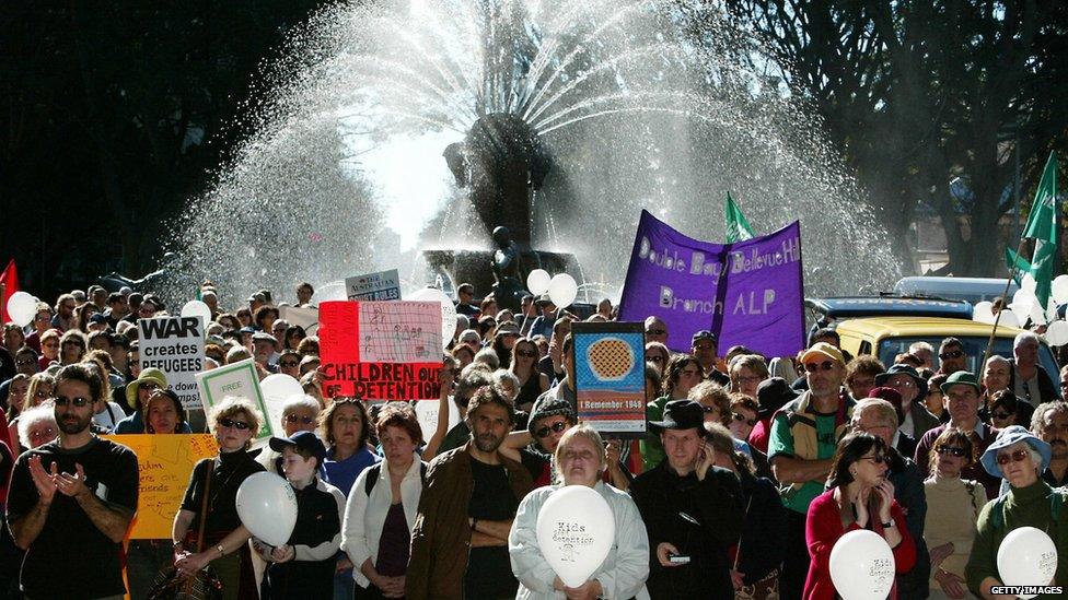 Around a thousand human rights and refugee advocates prepare to march through Sydney, 22 June 2003, to demand the release of refugees from mandatory detention centres.