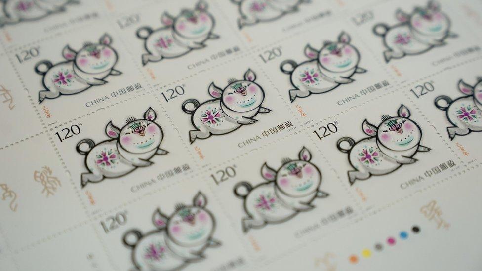 Close-up of some of the Year of the Pig stamps