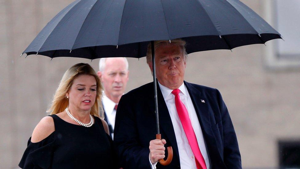 Pam Bondi with Donald Trump in August 2016