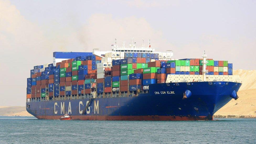 A cargo ship crosses the Suez Canal in Ismailia, Egypt on December 29, 2023