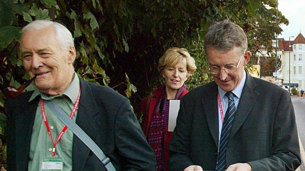 Tony Benn walks with his son Hilary and daughter Melissa