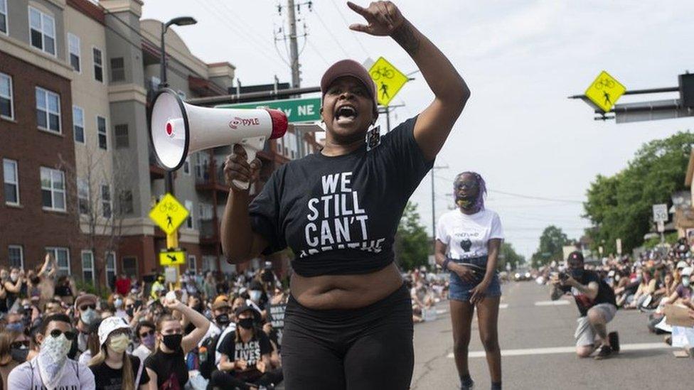 Demonstrators marching to defund the Minneapolis Police Department dance on University Avenue on June 6, 2020 in Minneapolis