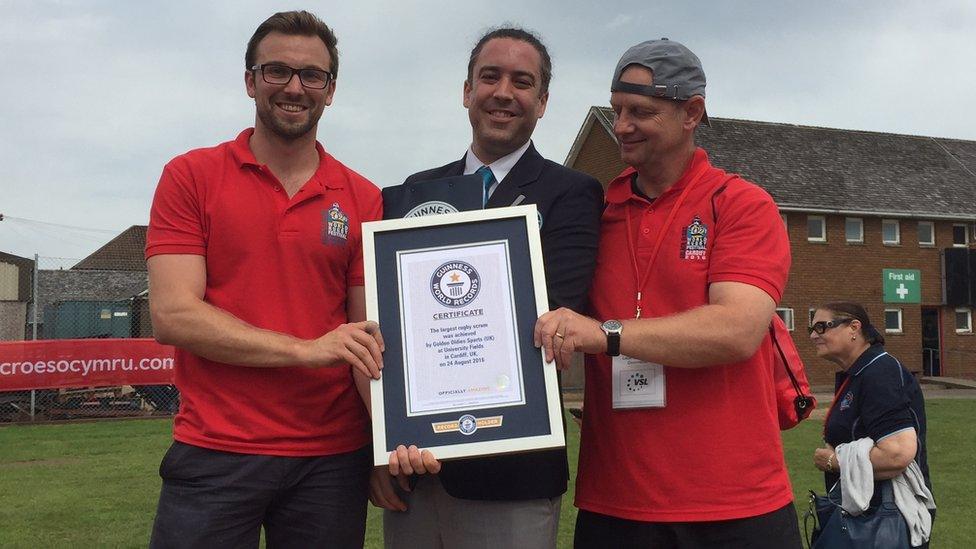 Rugby players with the world record certificate