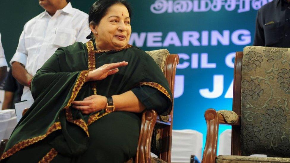 Jayaram Jayalalitha, leader of the Anna Dravida Munnetra Kazhagam (AIADMK) state political party, gestures during a campaign rally in Chennai on April 9, 2016.