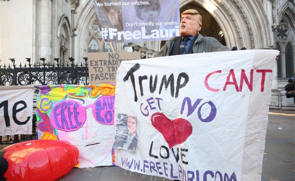 Lauri Love supporter and banners outside the High Court in London