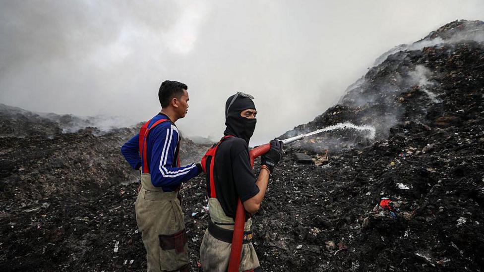 A mountain of rubbish in Indonesia has been on fire for more than a week