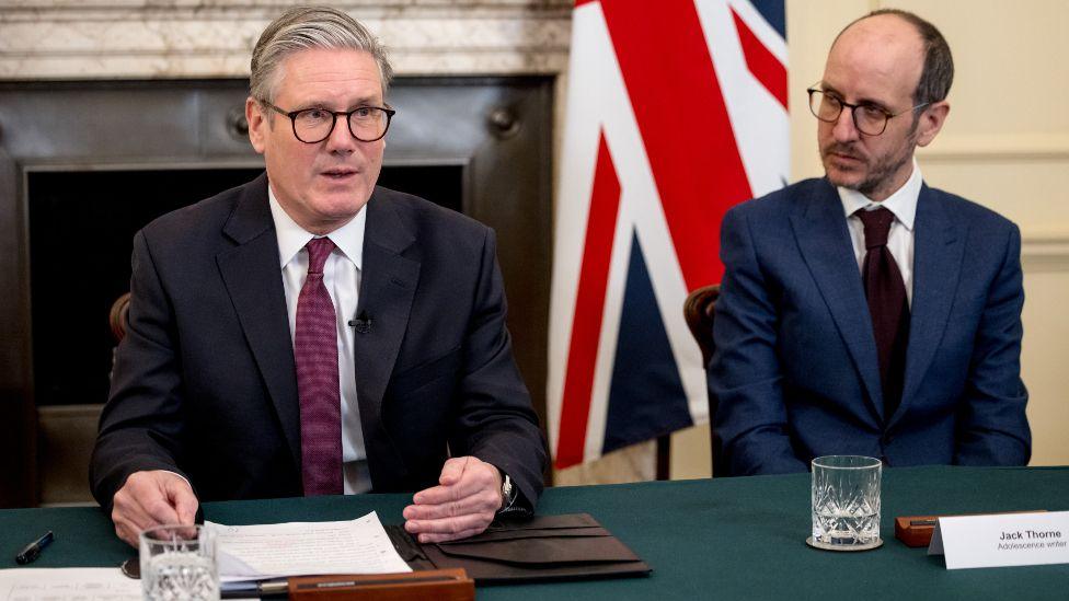 British Prime Minister Keir Starmer holds a roundtable meeting with writer Jack Thorne (R) at Number 10 Downing Street on March 31, 2025 in London,