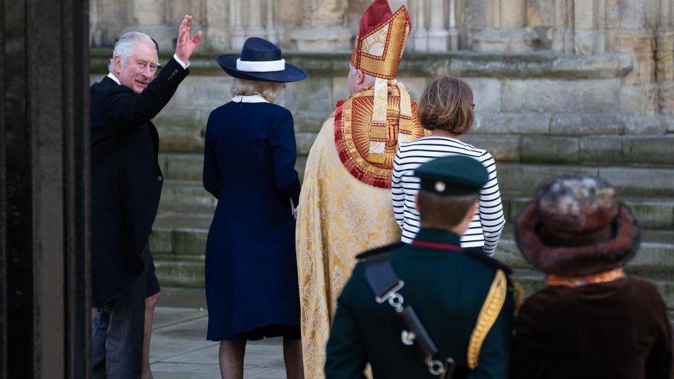 King Charles waving to crowds as he arrives at York Minster