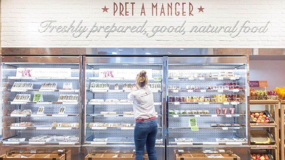 A staff member at Pret a Manger