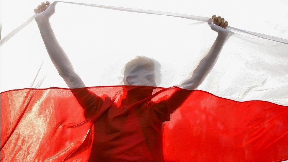 An opposition supporter at a rally in Minsk