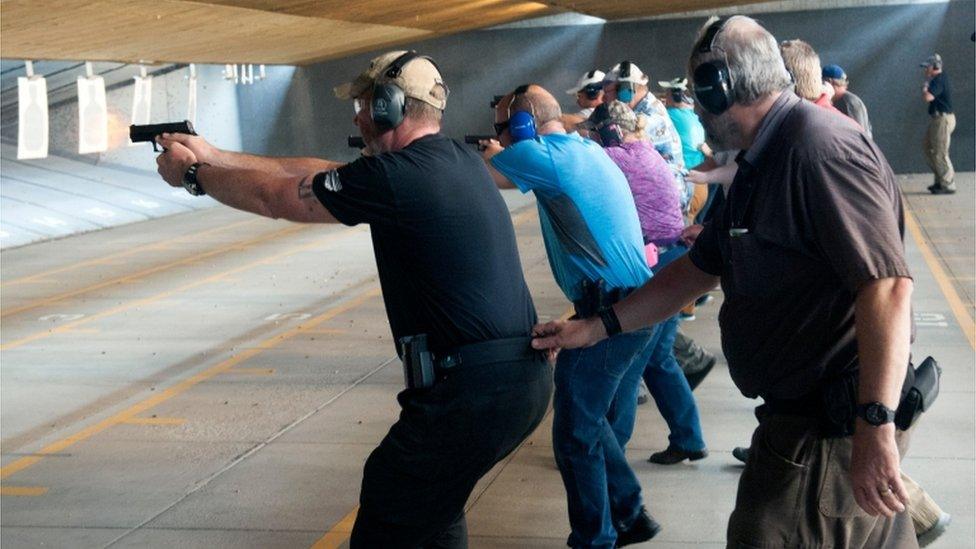 School staff firing guns