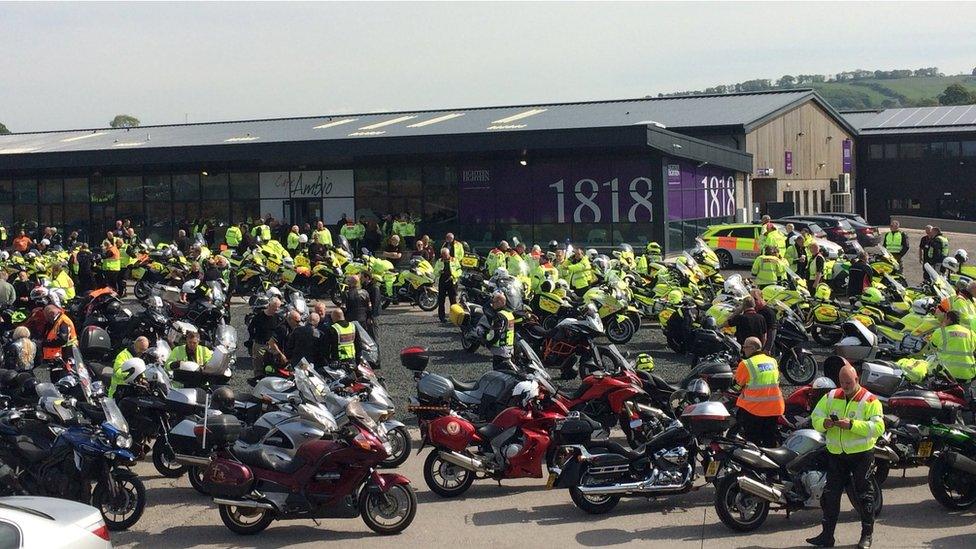 Motorcyclists gathering before funeral