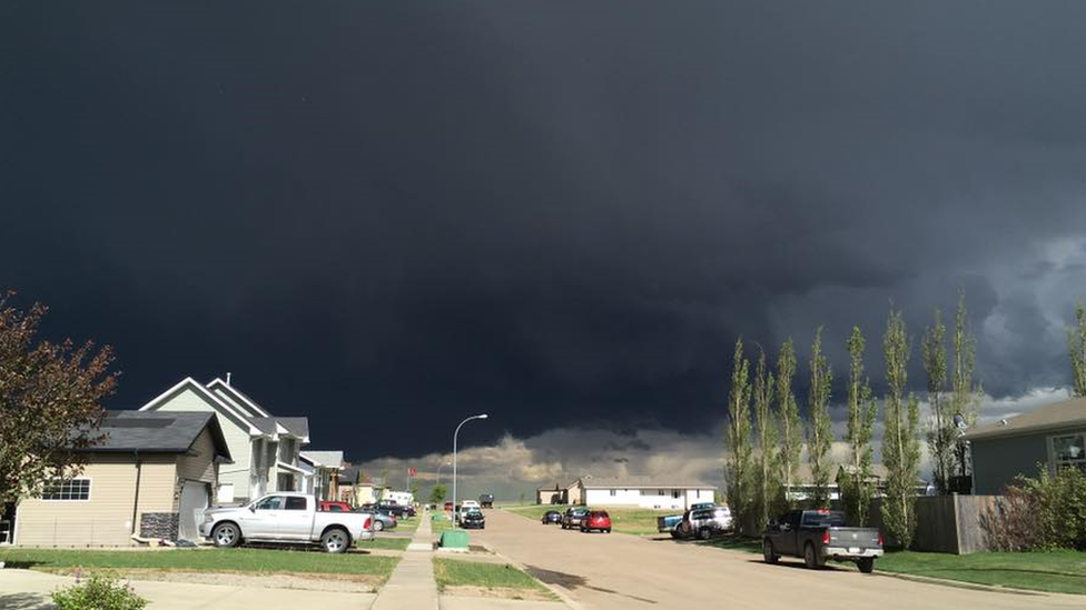 Cecilia Wessels' photo of a tornado above near Three Hills, Canada