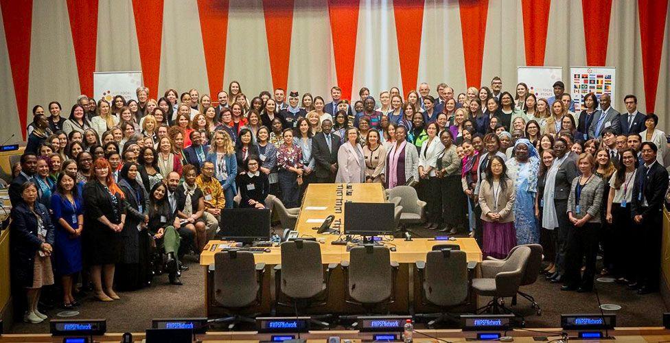 A group photo of mainly female delegates attending the Women, Peace and Security Focal Points Network event in New York. Gen Jama is seen in the front at the centre