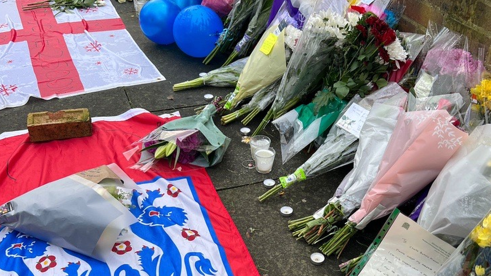 Flowers left at Sewell Road