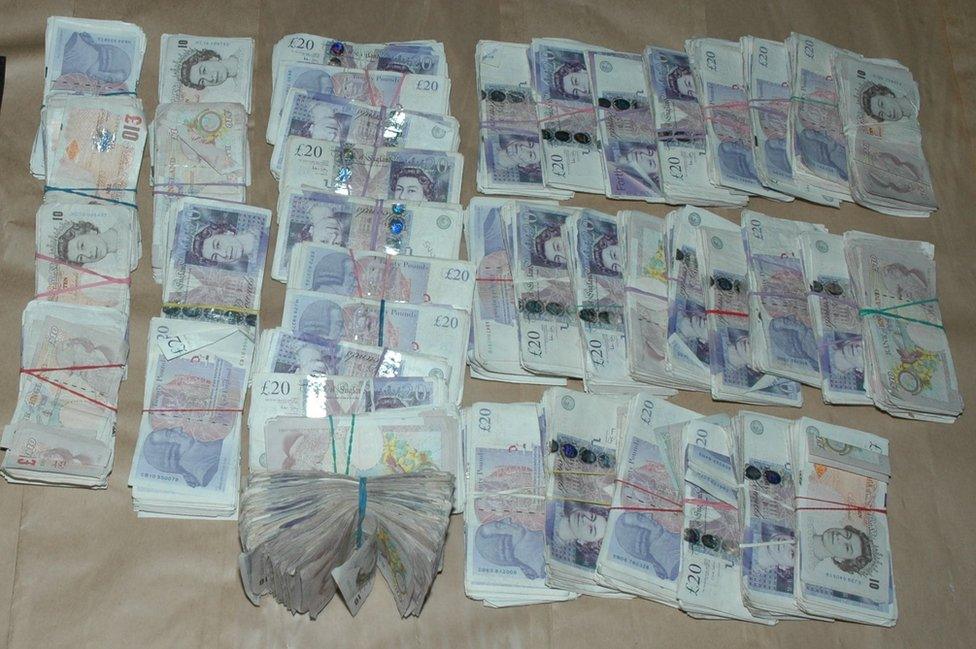 Seized bundles of cash