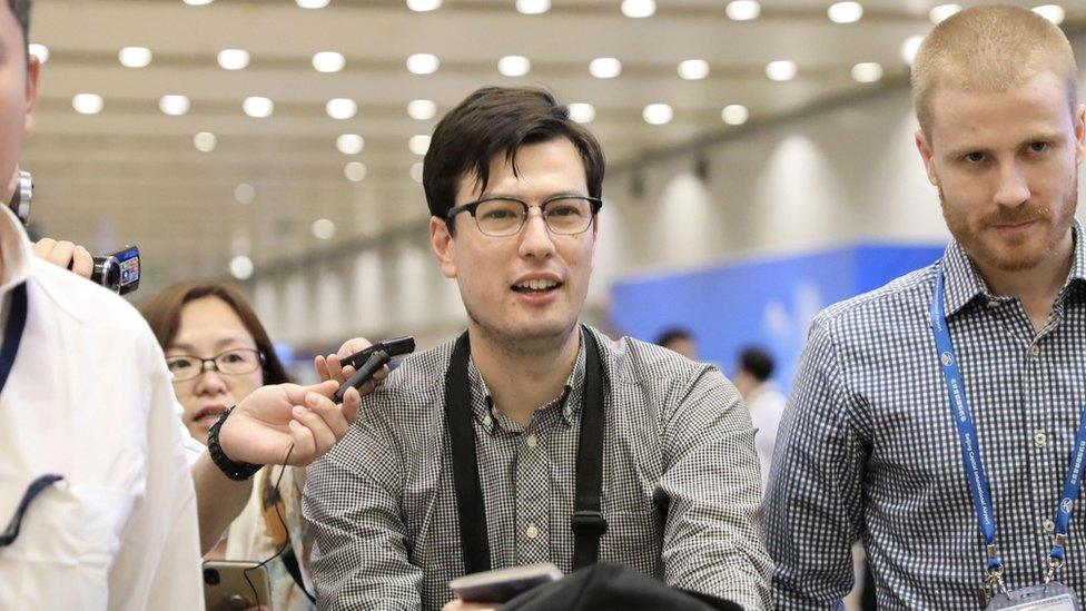 An Australian student Alek Sigley, 29, who was detained in North Korea, arrives at Beijing international airport in Beijing, China