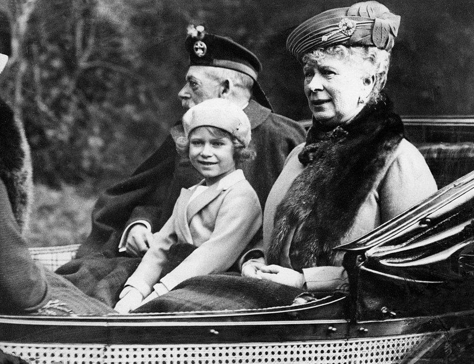 Princess Elizabeth sitting in the horse drawn carriage with her grandparents King George V and Queen Mary on the way back to Balmoral after attending church at nearby Crathie. 5th September 1932.