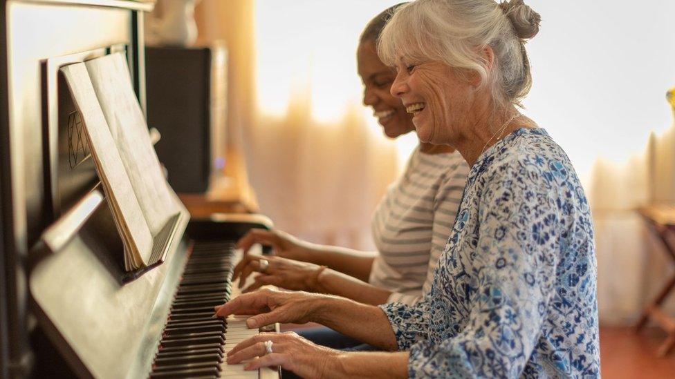 Women playing piano