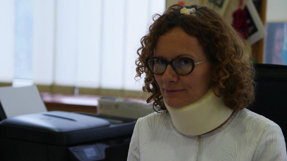 Radmila Sekerinska wearing a neck collar