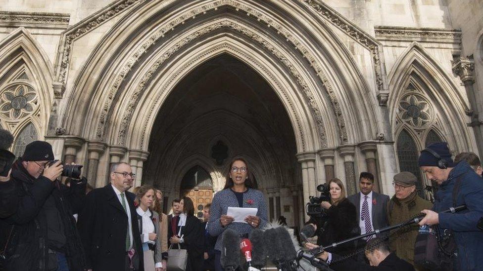 Lead claimant in the Article 50 case, Gina Miller (C), gives a statement outside of the High Court after a decision ruling in her landmark lawsuit