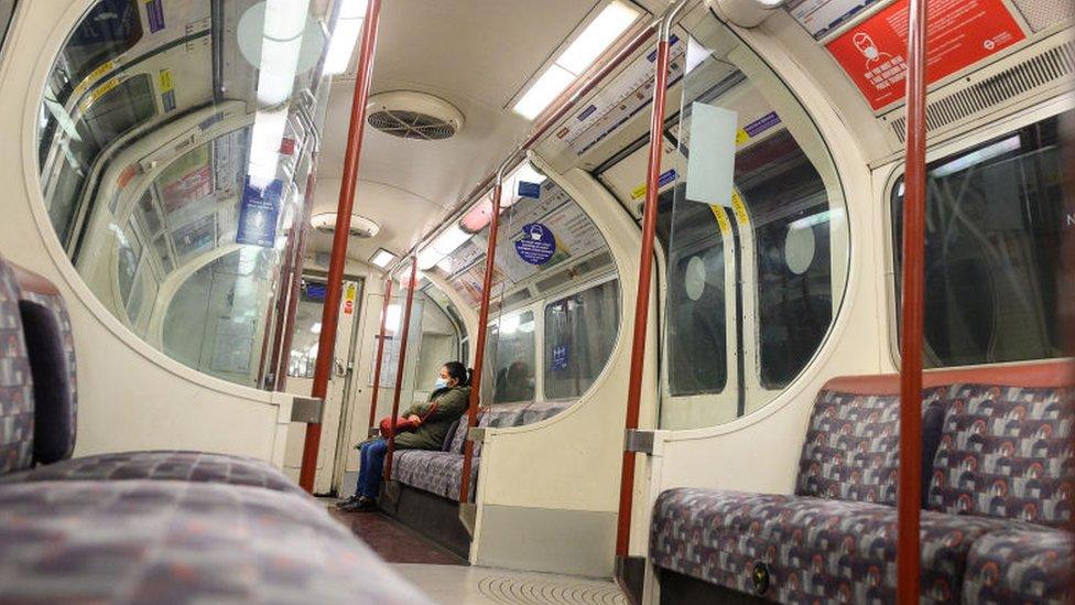 Woman alone on train