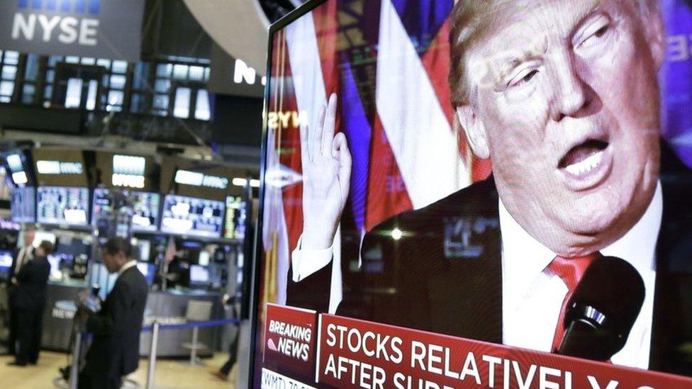 Donald Trump on a trading floor TV screen