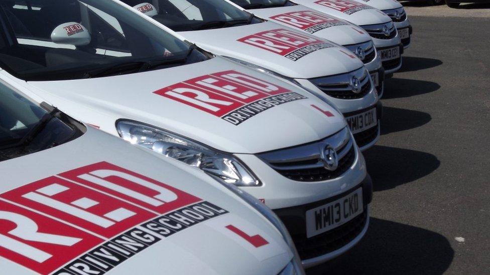 Red Driving School branded cars