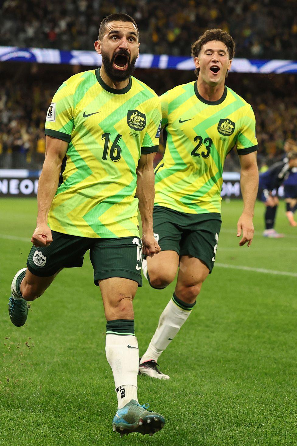 Aziz Behich of the Socceroos celebrates scoring a goal during the 2026 FIFA World Cup Asian Qualifier match with Japan at Optus Stadium. Photo by Robert Cianflone