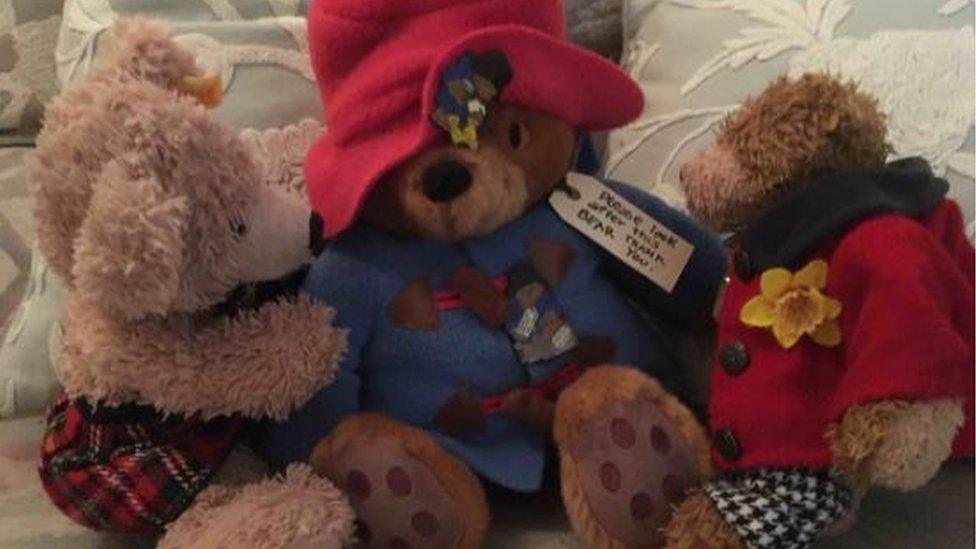 Paddington Bear toy with two other toy bears