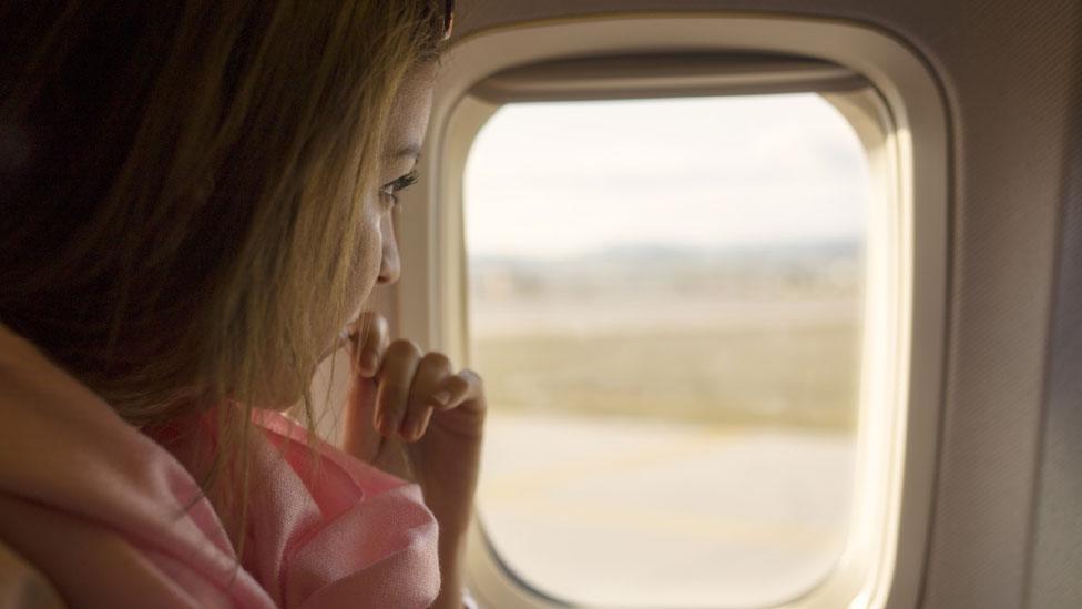 Woman on a plane