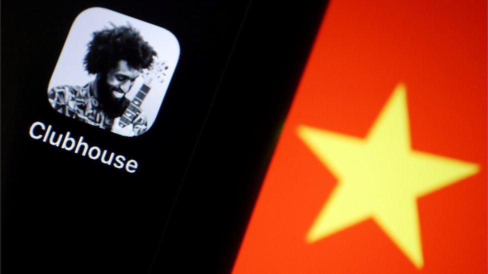 Clubhouse app icon seen next to a Chinese flag star