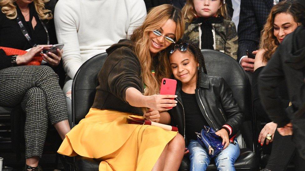 Blue Ivy and Beyonce at the 66th NBA All-Star Game in New Orleans, Louisiana.