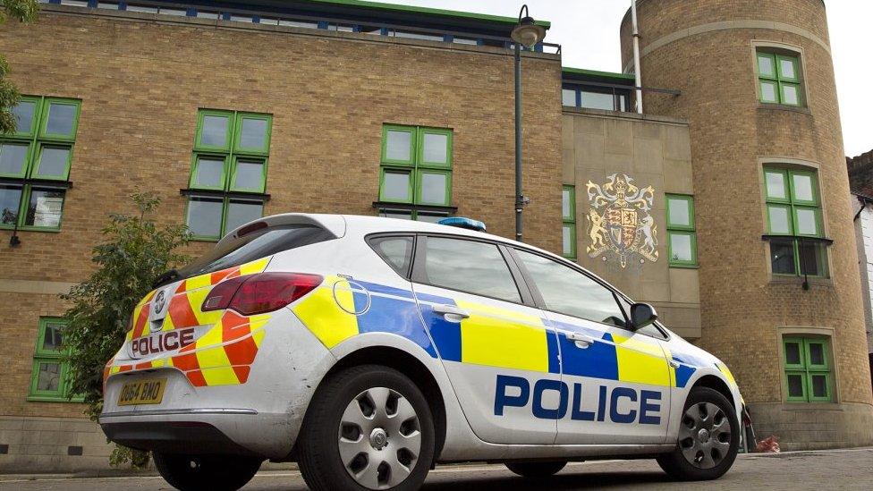 Police car outside Luton Crown Court